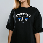 akimbo n bob varsity tee